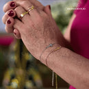 Pulseira de Crucifixo Inoxidável e Folheada a Ouro